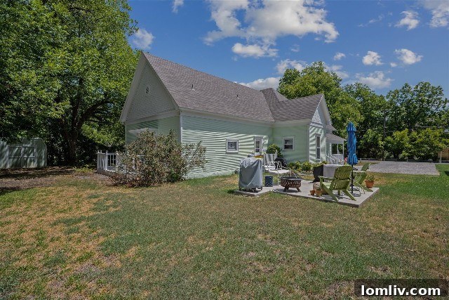 A spacious outdoor area behind the historic Grandview home, perfect for family gatherings and neighborhood parties.