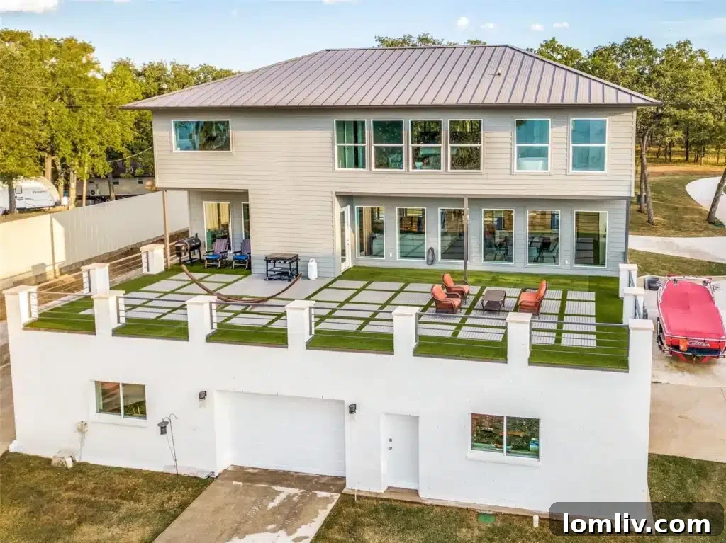 Exterior view of a modern lake house at 222 September Drive