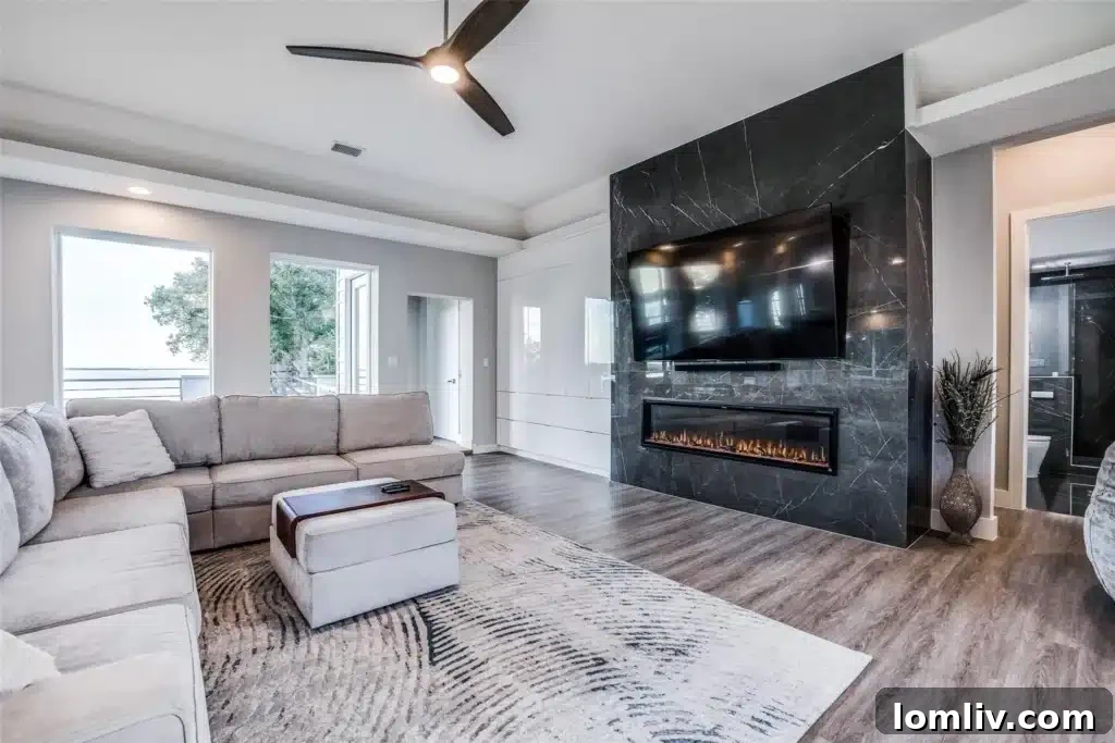 Spacious living area with modern decor and high ceilings