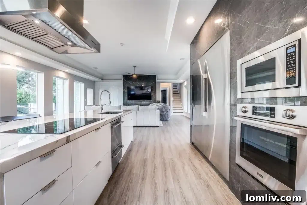Gourmet kitchen with large island and commercial appliances