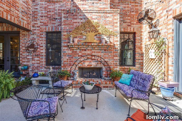 Private interior patio accessible from living room, kitchen, and primary suite