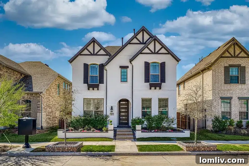 Charming brick exterior of a two-story home in Arlington's Viridian development