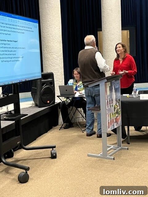 Councilwoman Gay Donnell Willis engages in discussion with consultant Jim Copple during the Dallas City Council's Vision Alignment Session.