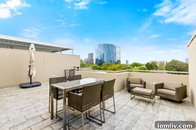 Modern kitchen with high-end appliances, white cabinetry, and a large island, ideal for entertaining.