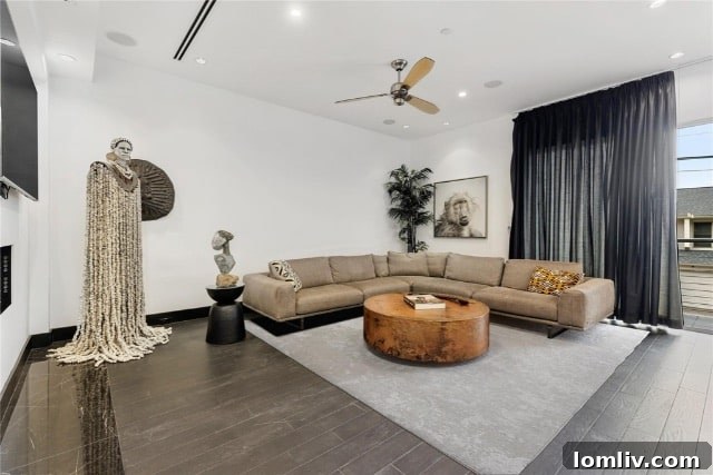 Sophisticated interior hallway featuring black-stained oak floors and refined decor, emphasizing clean lines.