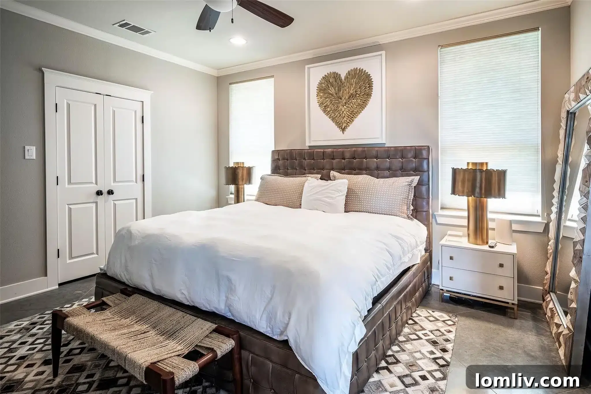 Spacious and elegantly furnished bedroom in the detached guest house, providing comfort and privacy for visitors.