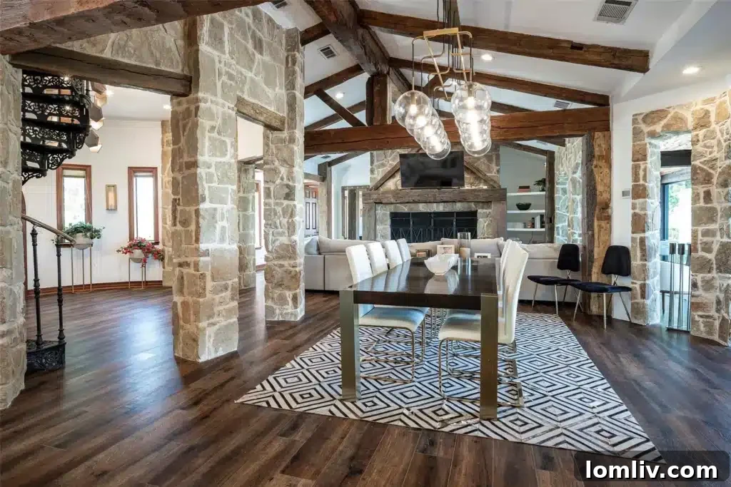 Spacious 80-foot sunroom with floor-to-ceiling windows offering expansive lake views, creating a bright and flexible living or dining space.