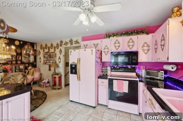 More pink kitchen elements, including decorative items and small appliances