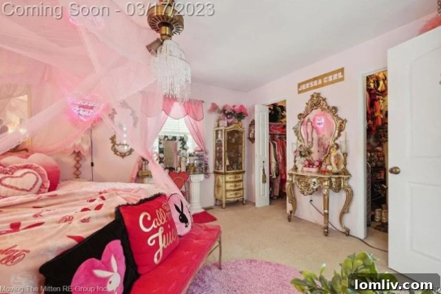 Neon lighting and a large illuminated mirror in the Barbie-themed bedroom