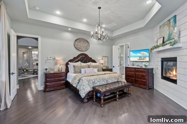 Luxurious primary bathroom with walk-in shower and large garden tub