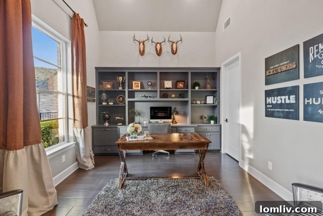 Dedicated home office space with built-in shelving, ideal for remote work in this Heath Golf and Yacht Club home