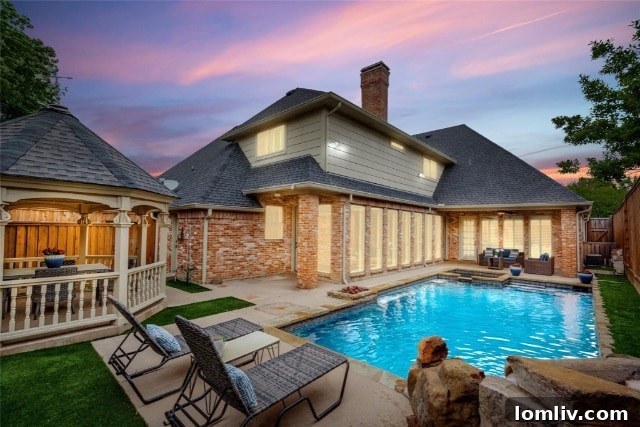Luxurious primary bathroom with a huge walk-in shower, freestanding tub, and elegant vanity.