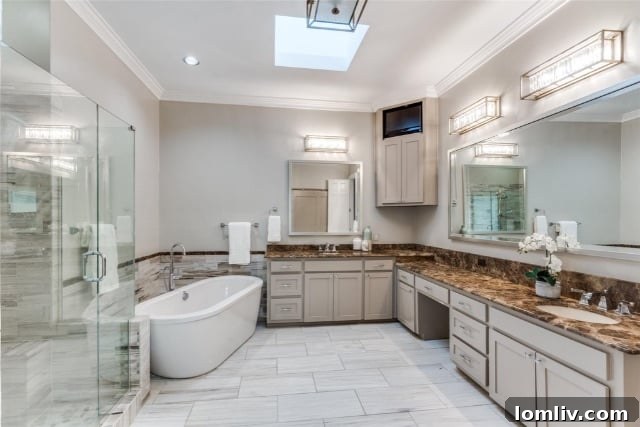 Spacious primary bedroom featuring elegant built-in shelving and drawers, offering ample storage and display space.
