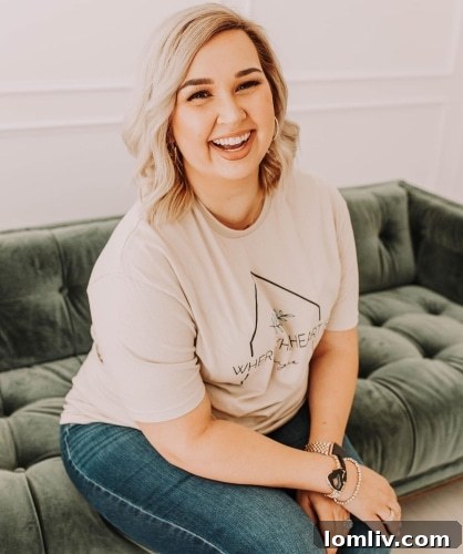 Savannah Jones, co-founder of Where The Heart Is Designs, smiling confidently