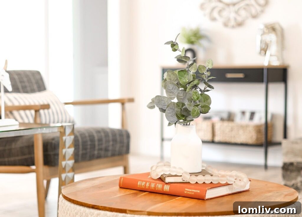 A beautifully staged living room by Where The Heart Is Designs, with natural light