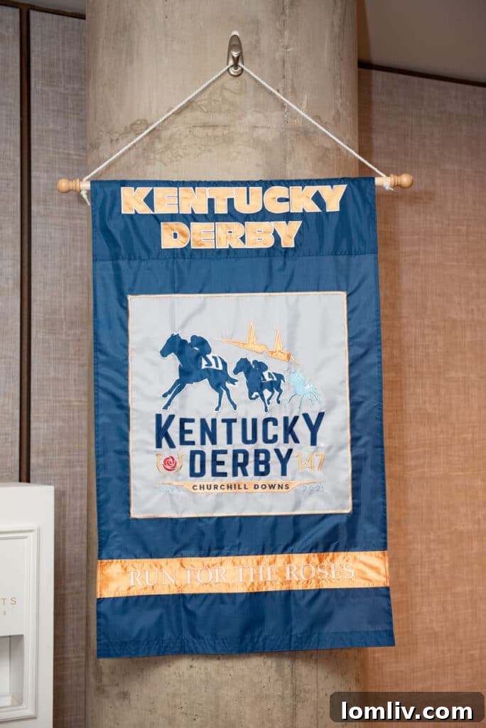 HALL Arts Lifestyle Director Reigns Supreme with Derby Day Revelry 4 Elegant Kentucky Derby decorations featuring floral arrangements and equestrian motifs, setting a sophisticated tone.
