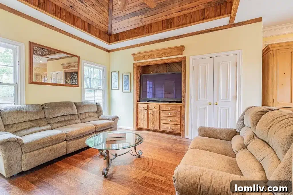 Vaulted Ceiling with Wood Design in Living Room