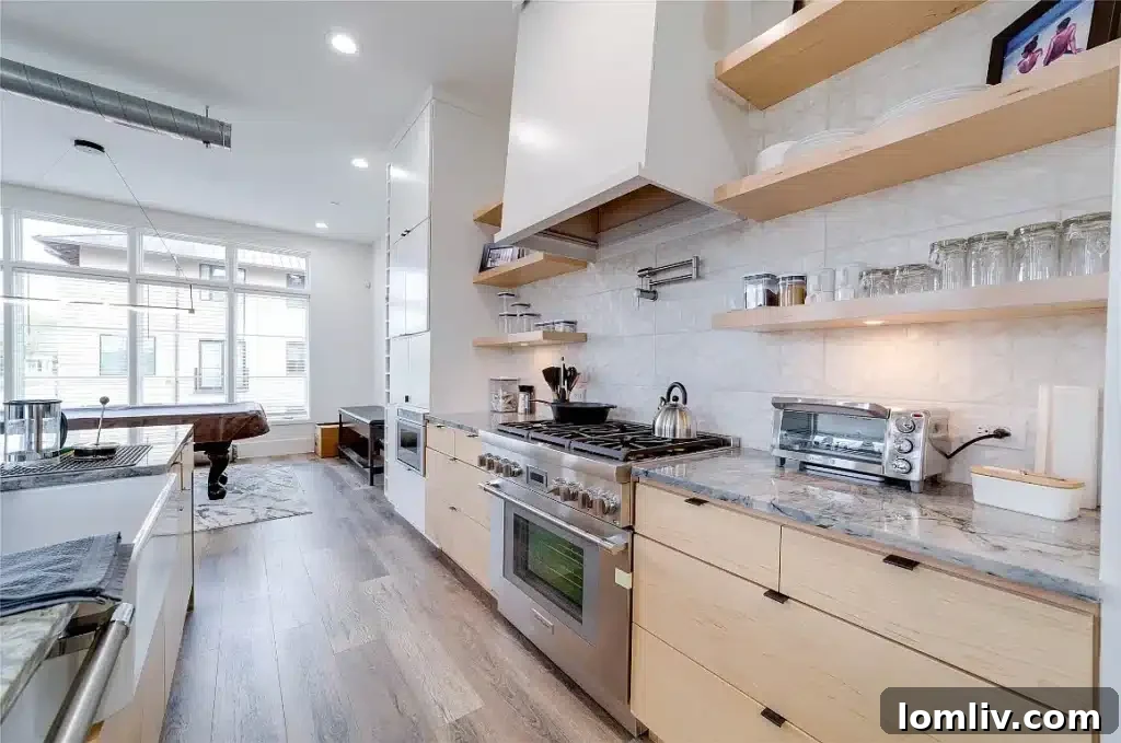 Contemporary Townhome with Warm Woods and Gleaming Appliances