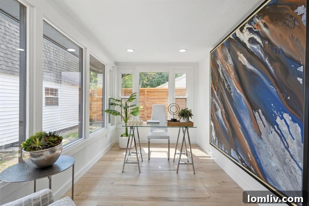 Dedicated home office with oversized windows and recessed lighting