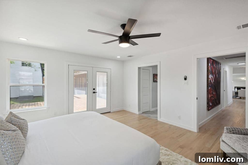 Spacious primary suite with private backyard access and abundant natural light