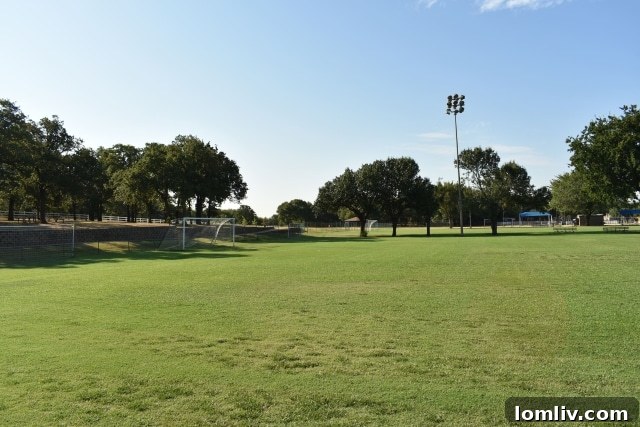 Stormie Jones Park in Bedford, a spacious 13-acre community park perfect for recreation, sports, and family fun.