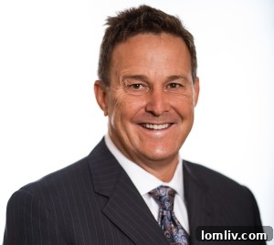 Professional headshot of Realtor Eric Roark smiling