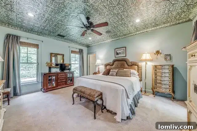 Elegant Primary Bedroom with Unique Ceiling Detail