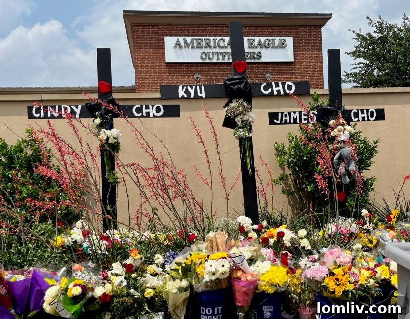 Three crosses stand for Kyu and Cindy Cho, and their 3-year-old son James, who were killed. Son William, age 6, survived the attack.