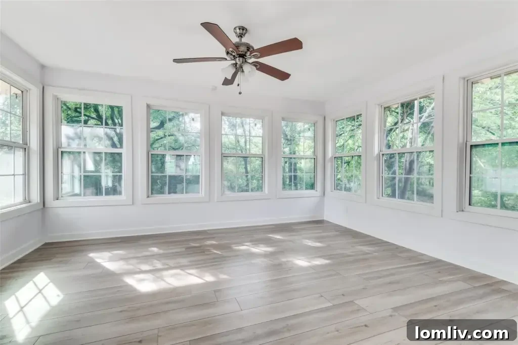 Spacious primary bedroom featuring ample natural light