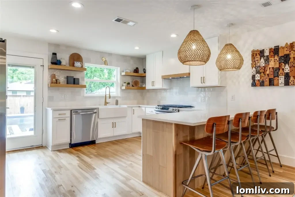 Modern kitchen with quartz counters and eat-in bar