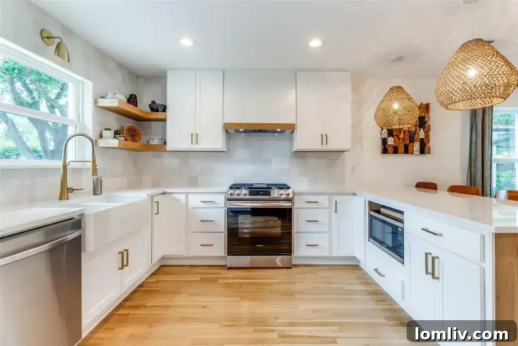 View of the kitchen with custom cabinetry and open shelving
