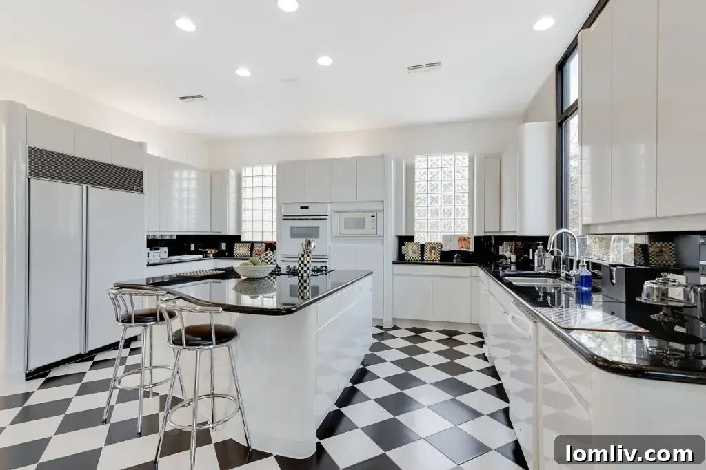 Sleek modern kitchen with minimalist design, high-gloss finishes, and integrated appliances.