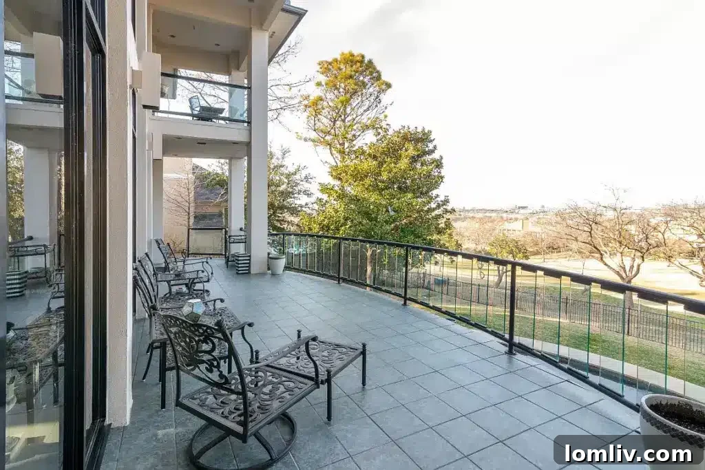 Expansive outdoor patio area on a higher floor, offering panoramic views of the golf course and surrounding landscape.