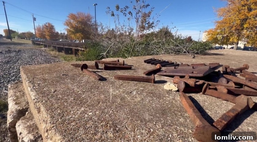 Empty railroad land in downtown Arlington, adjacent to buildings