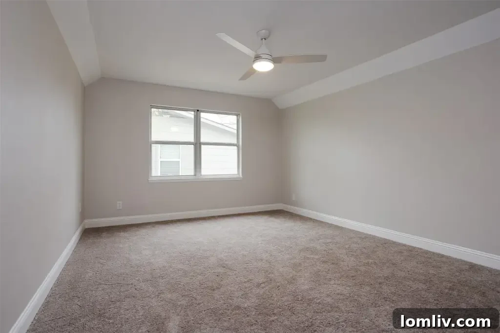 A comfortable bedroom with contemporary decor and good natural lighting at 8740 Charing Cross Lane.