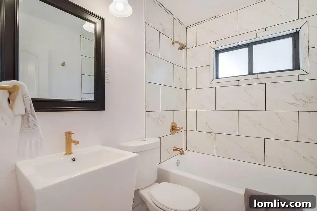 Comfortable bedroom space with ample light and contemporary design elements.
