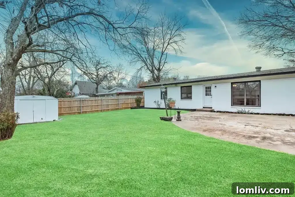 Backyard space at 9740 Ash Creek Drive, offering a private outdoor retreat.