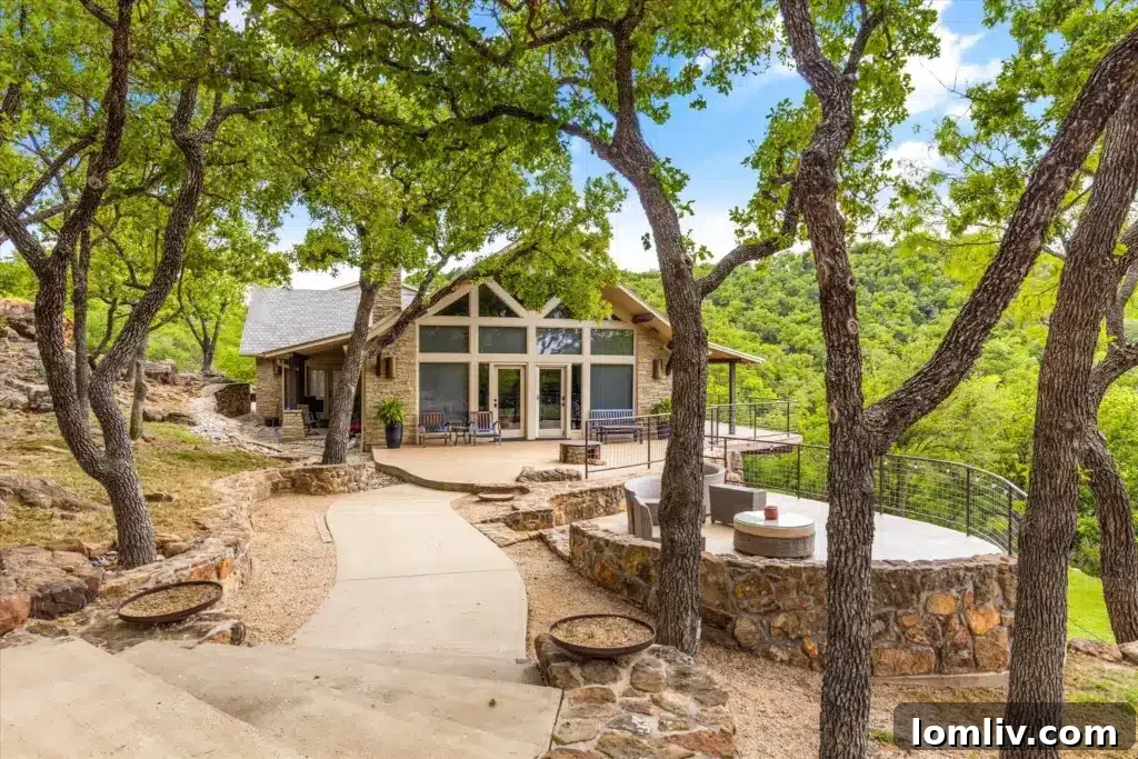 Another view of the home's striking architecture, showcasing its integration with the surrounding landscape.
