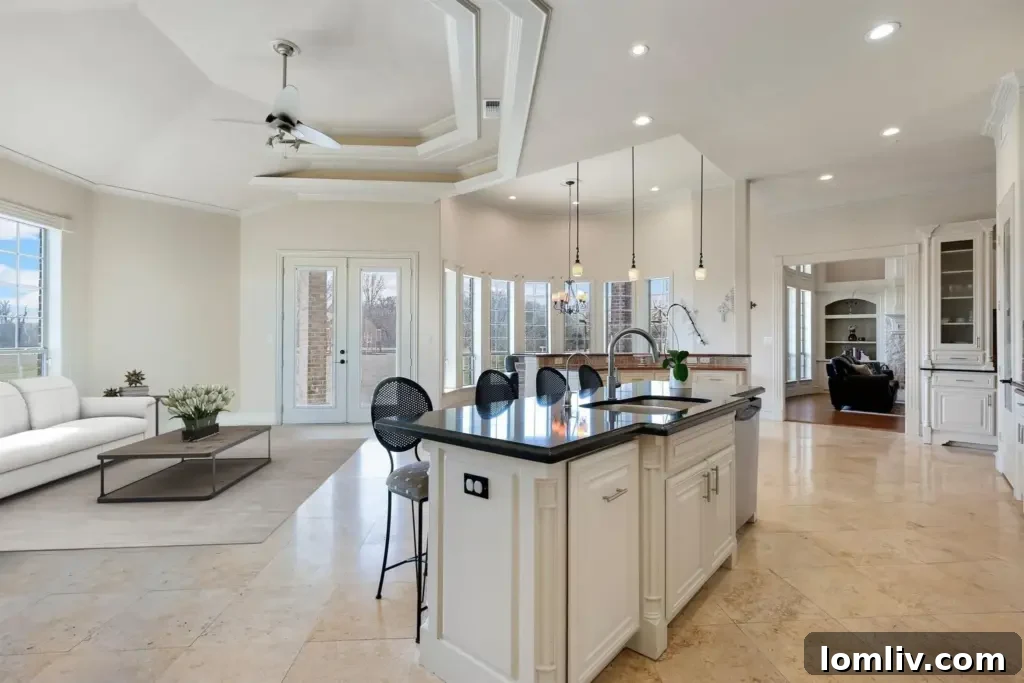 Open concept living and dining area designed for entertaining guests in a spacious McKinney home.