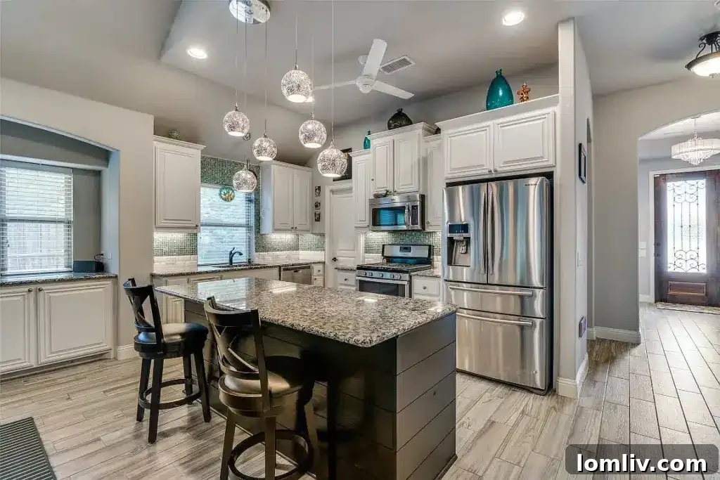 Spacious master bathroom with walk-in shower, dual sinks, and modern vanity in Wylie home