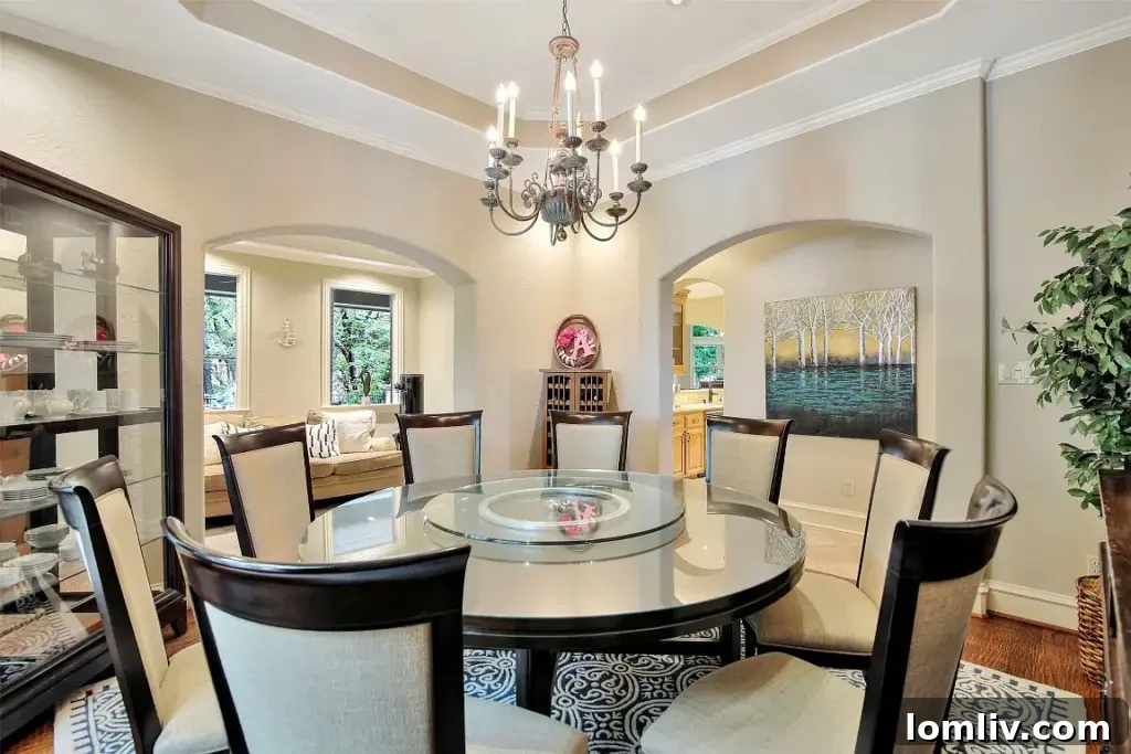 Elegant living room with high ceilings, expansive windows, and sophisticated decor in Seis Lagos