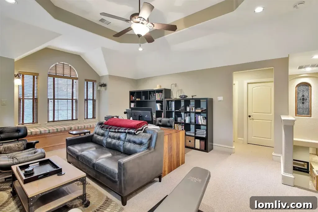 Outdoor living space with stunning views and ample seating at 203 Lago Grande Trail, Wylie TX