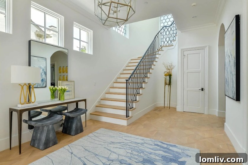 Traci Connell Redefines Luxury in This Modern Mediterranean 3 Grand entrance of a luxury Modern Mediterranean home