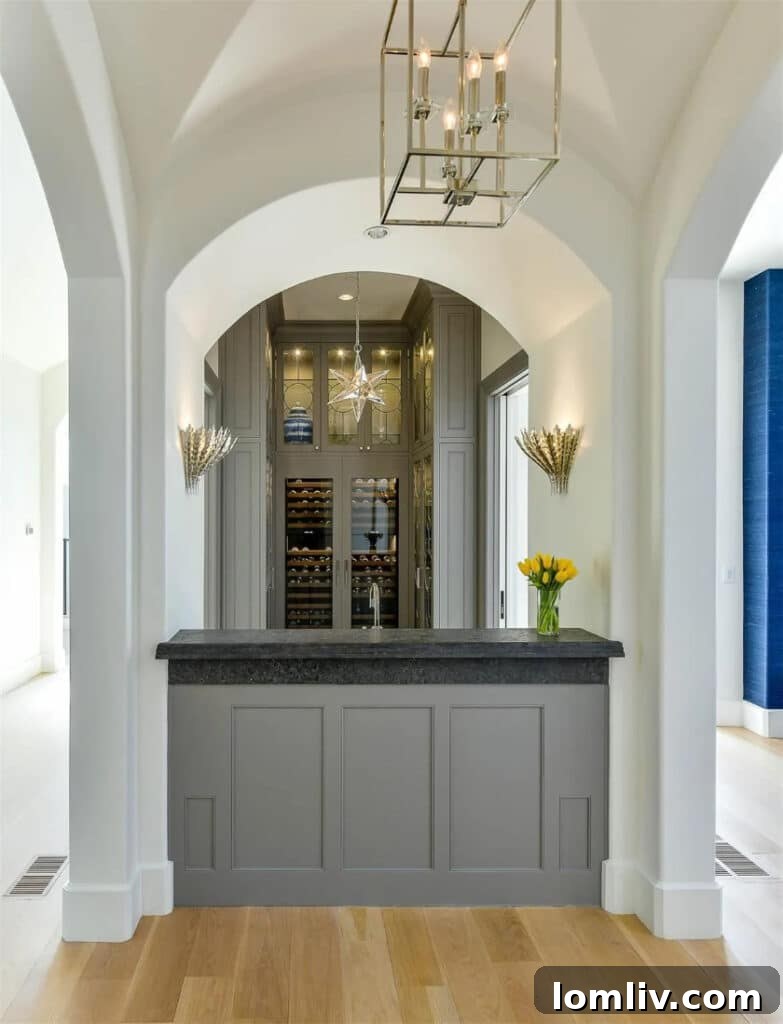 Traci Connell Redefines Luxury in This Modern Mediterranean 8 Modern Mediterranean kitchen island with bar seating