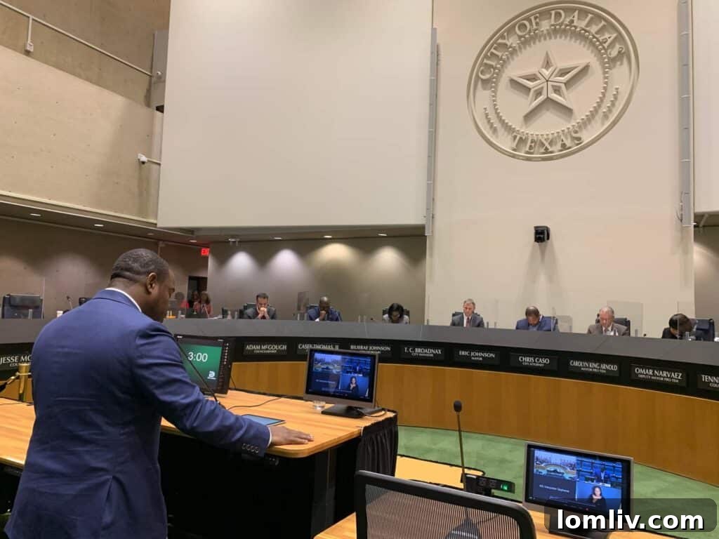 Dallas City Councilman Zarin Gracey delivering an invocation at a council meeting.