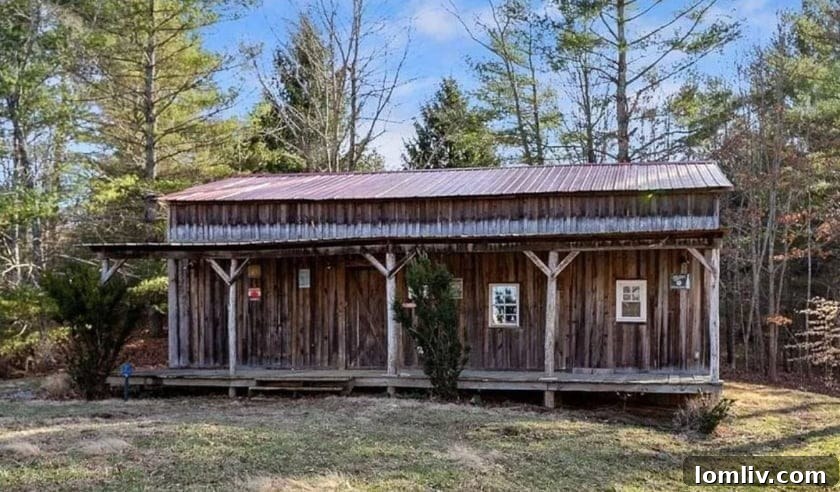 Locust barn with front porch on Virginia property