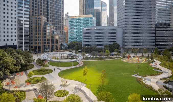 A panoramic view of a vibrant urban park in Dallas, showcasing lush green lawns, walking paths, and modern city architecture in the background, symbolizing the city's green space transformation.