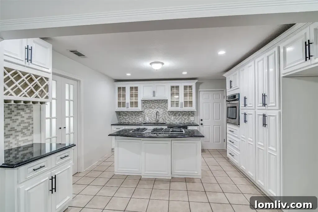 Open concept living area with hardwood floors and natural light