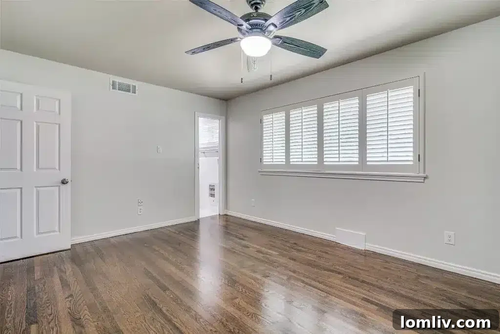 Modern chef's kitchen with granite countertops, stainless steel appliances, and island range