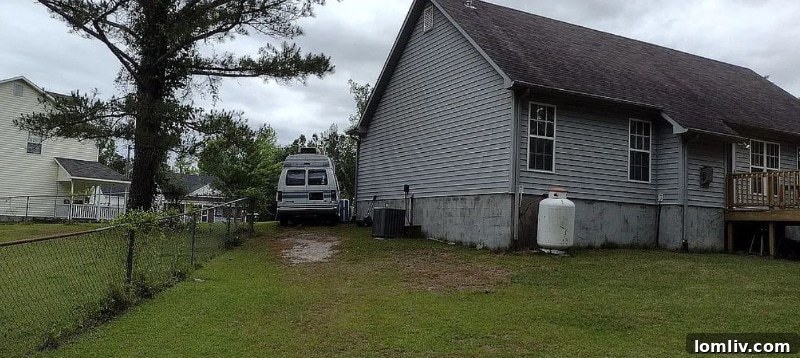 View of the house exterior from a different angle at 211 Remington Drive